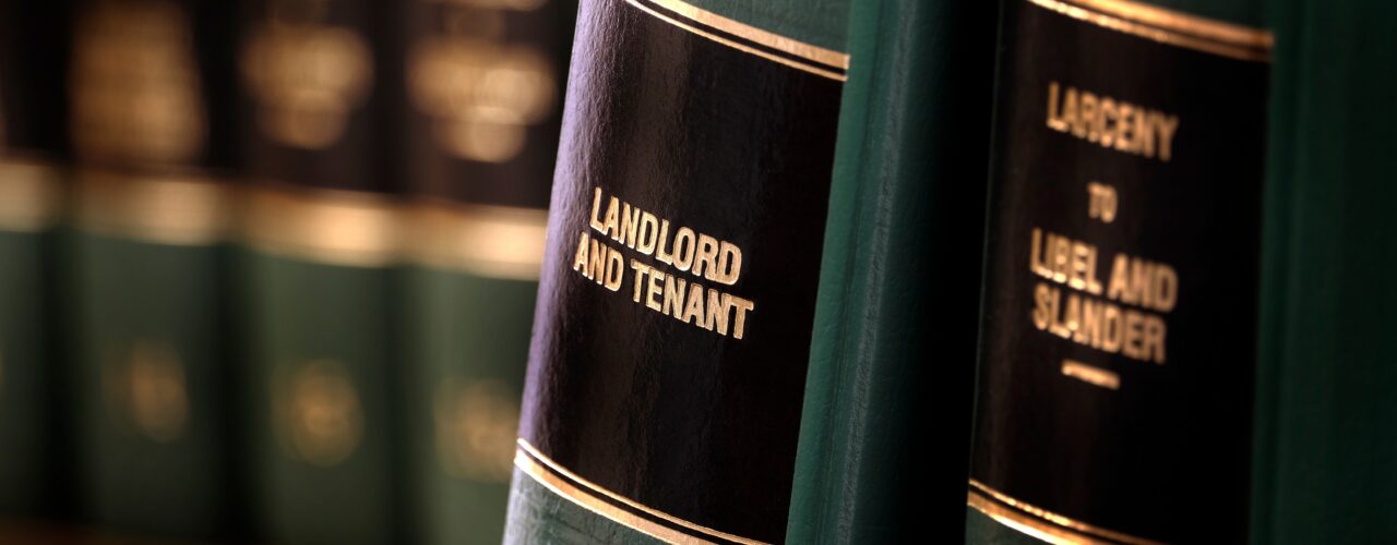 A law book that says 'Landlord and Tenant'