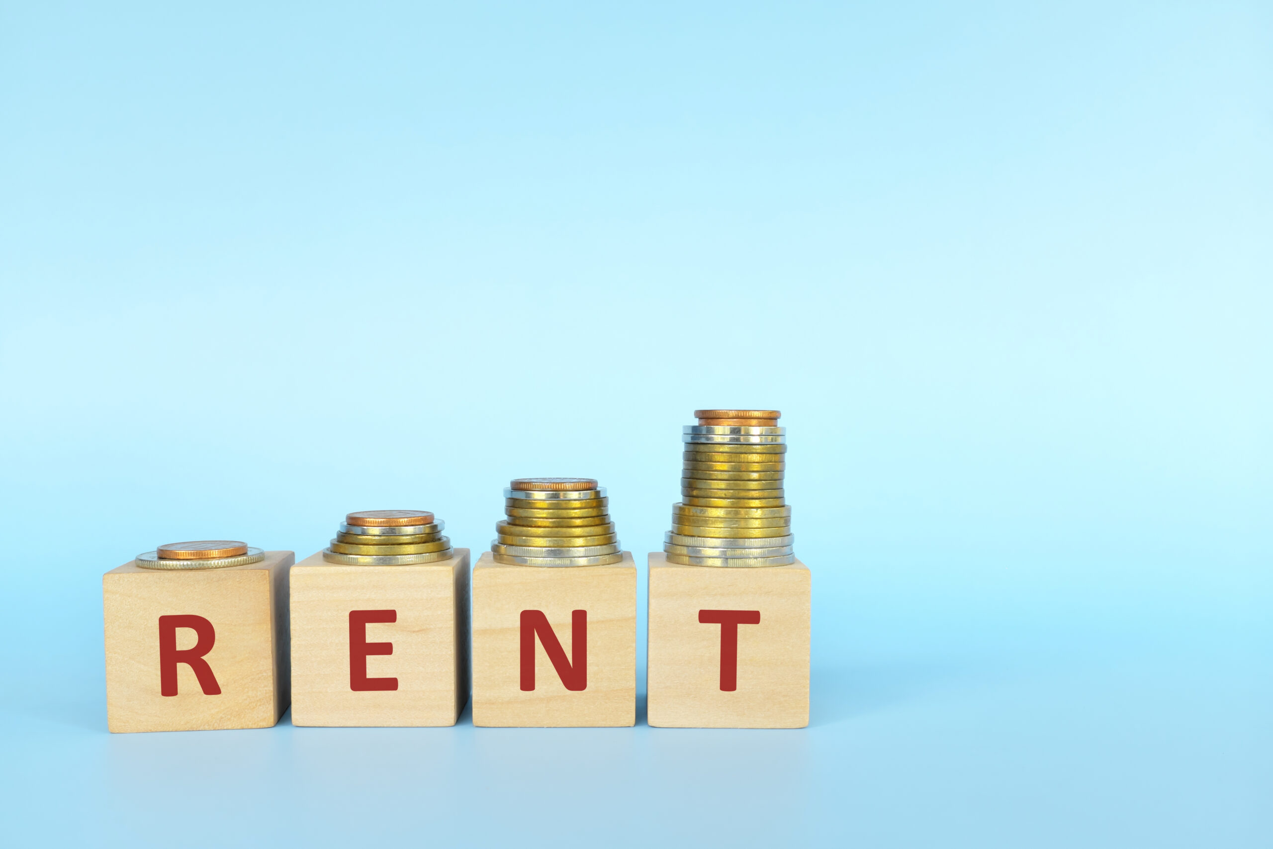The word 'rent' spelled out with letter blocks.