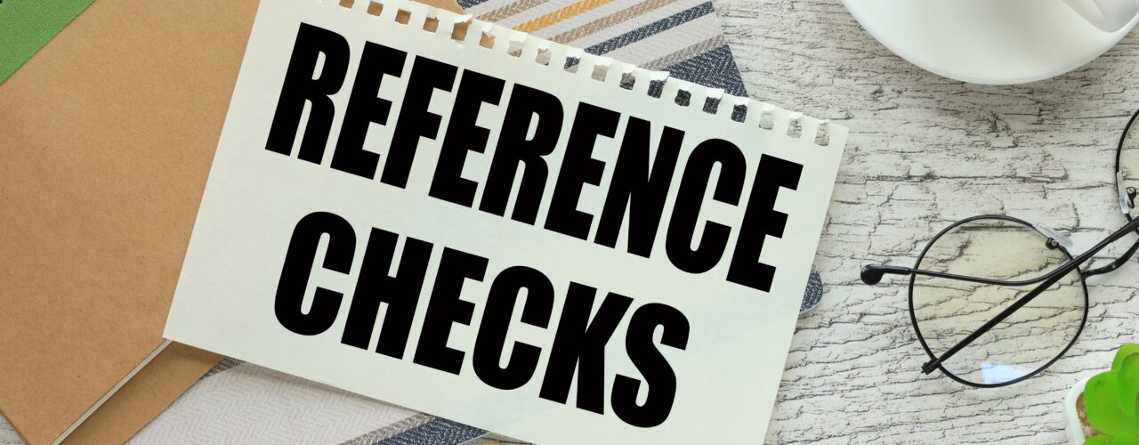 A sign that says 'reference checks'