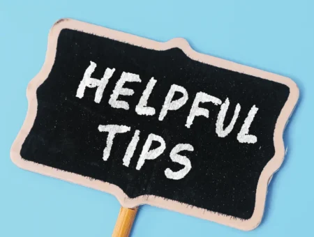 A chalk board sign with the words "helpful tips" on