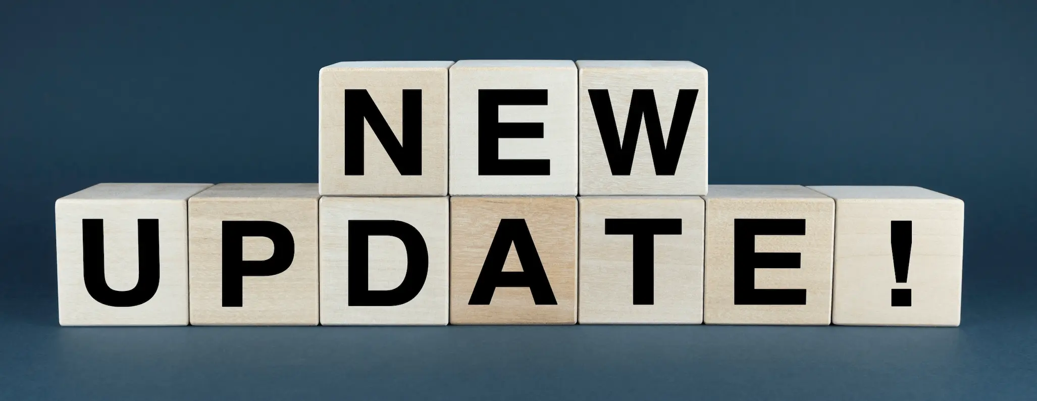 Wooden blocks spelling out new update