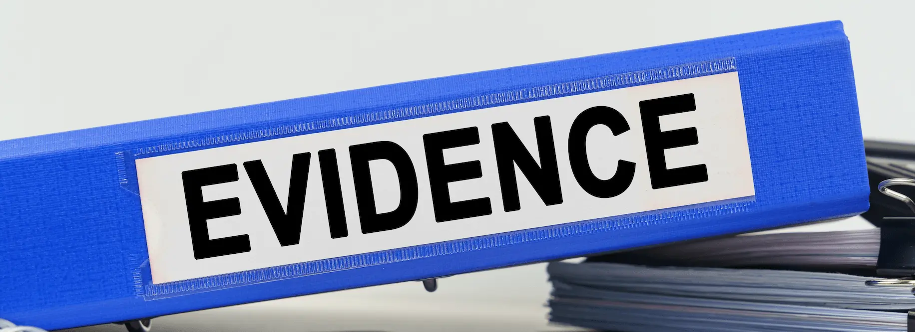 A blue folder titled evidence