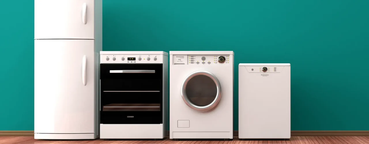 A row of white appliances for rental property including a fridge, oven, washing machine and dishwasher