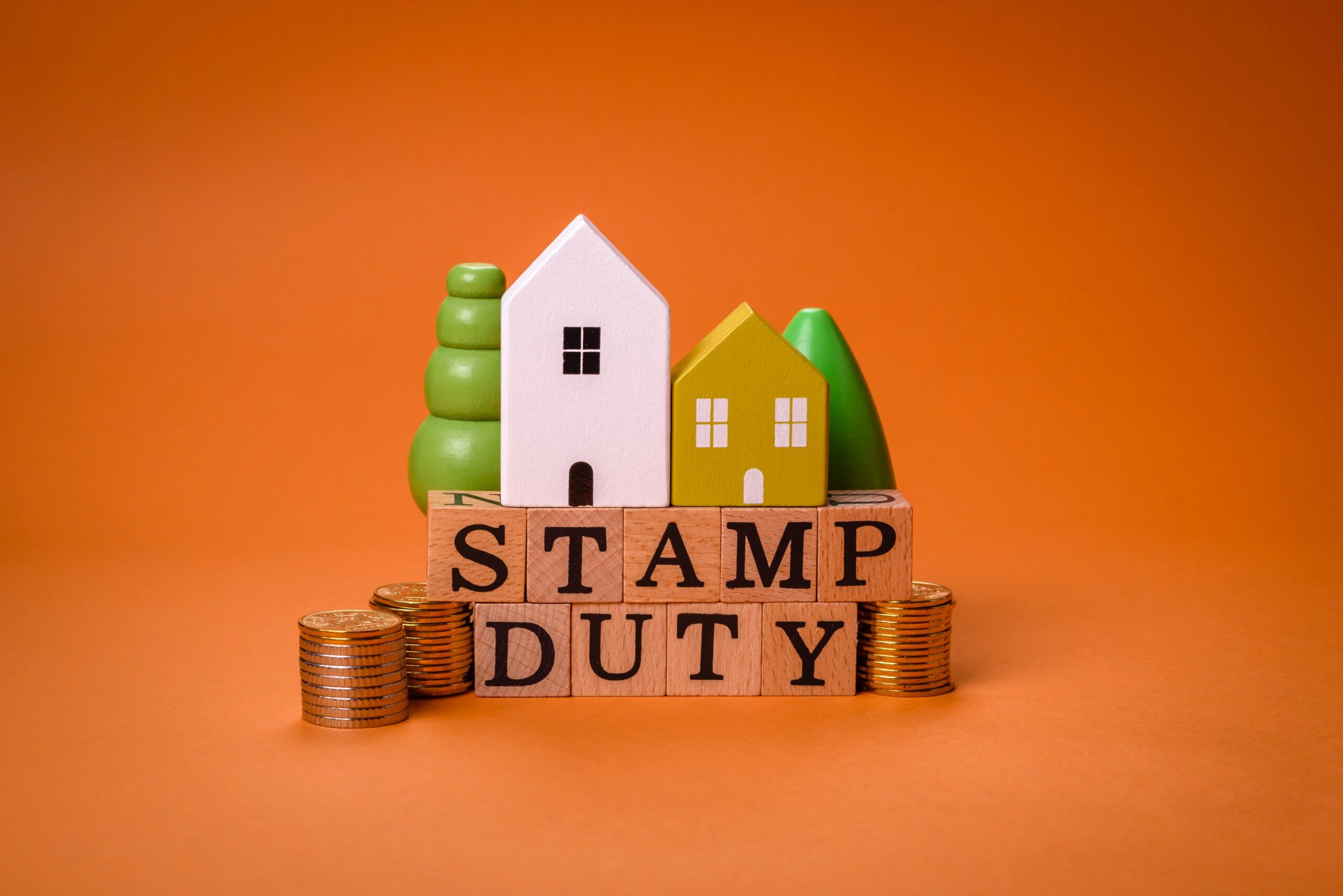 An image of houses with 'stamp duty' sign