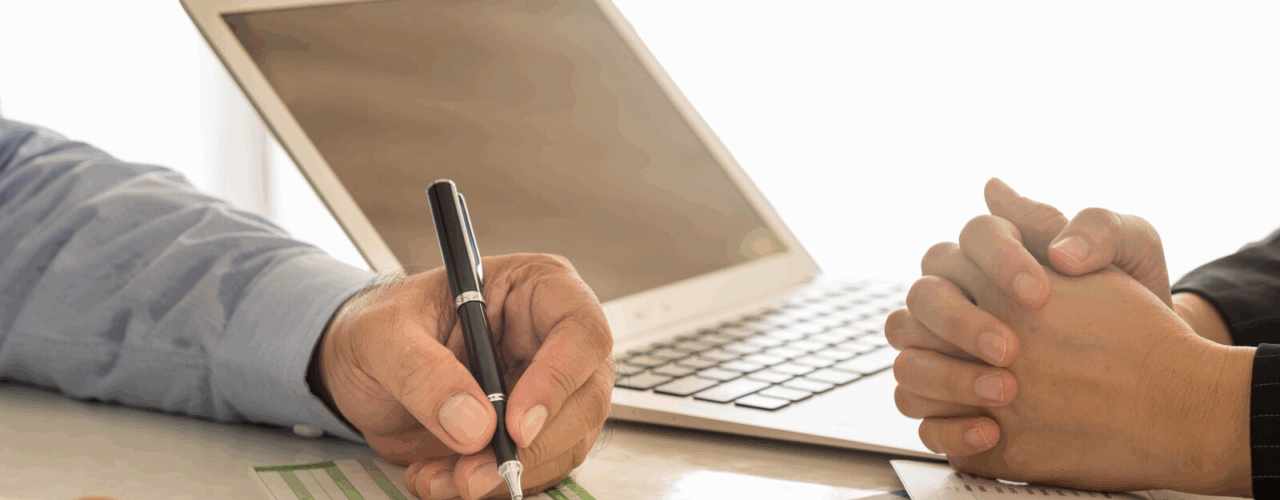 Landlord signing documentation for a holding deposit agreement