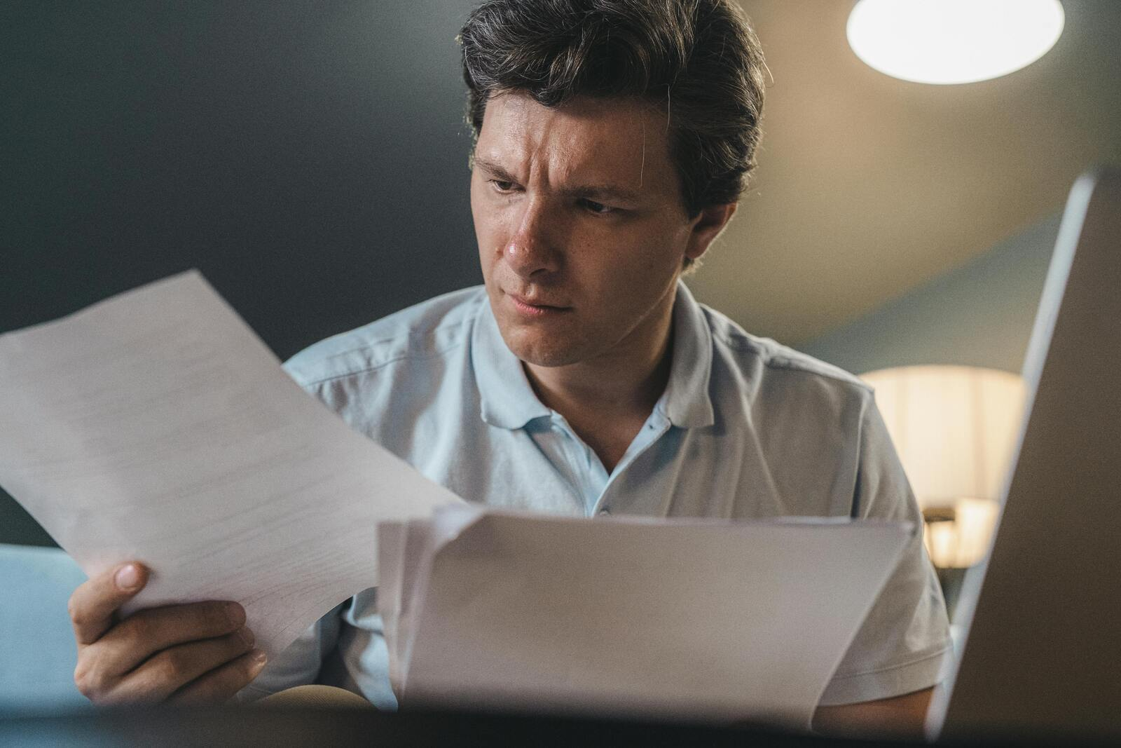 A landlord checking documentation