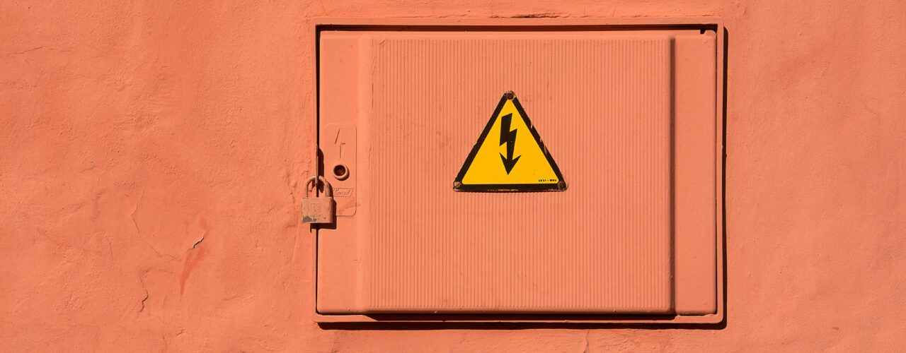 An electrical safety sign in a holiday let