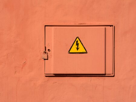 An electrical safety sign in a holiday let